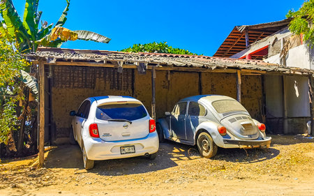 Puerto Escondido Oaxaca Mexico March 25, 2023 Various colorful tuned old classic vintage beetle car cars vehicle vehicles in Puerto Escondido Zicatela Oaxaca Mexico.のeditorial素材