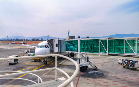 Guadalajara Jalisco Mexico March 30, 2023 Guadalajara International Airport with aircraft runway and indoor building and gate in Guadalajara Jalisco Mexico.のeditorial素材