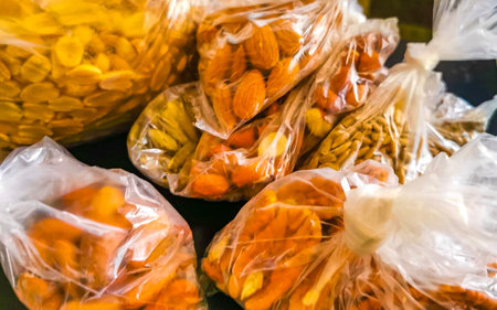 Various nuts in bag pecans peanuts pumpkin seeds sunflower seeds almonds in Playa del Carmen Quintana Roo Mexico.の写真素材