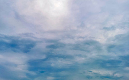 Blue sky with chemical cumulus clouds chemical sky scalar waves and chemtrails on sunny day in Playa...