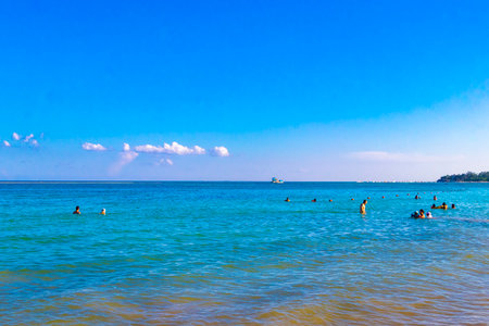Playa del Carmen Quintana Roo Mexico August 5, 2023 Tropical Mexican Caribbean beach and cenote panorama view with a lot of fun people sun loungers parasols from Punta Esmeralda in Playa del Carmen Mexico.のeditorial素材