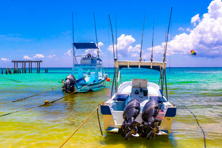 Playa del Carmen Quintana Roo Mexico August 05, 2023 Boat yacht catamaran ship ferry jetty pier and harbor at the tropical Mexican Caribbean beach panorama view and turquoise blue water in Playa del Carmen Mexico.の写真素材