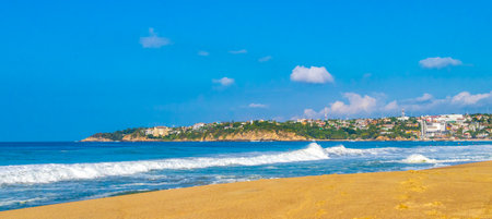 Extremely huge big powerful surfer waves on the beach in Zicatela Puerto Escondido Oaxaca Mexico.の写真素材