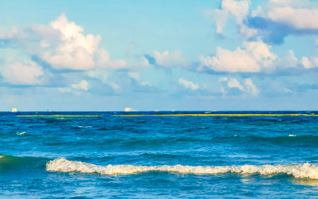 Boat yacht catamaran ship ferry jetty pier and harbor at the tropical Mexican Caribbean beach panorama view and turquoise blue water in Playa del Carmen and Cozumel island Mexico.の写真素材