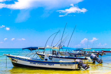 Playa del Carmen Quintana Roo Mexico August 05, 2023 Boat yacht catamaran ship ferry jetty pier and harbor at the tropical Mexican Caribbean beach panorama view and turquoise blue water in Playa del Carmen Mexico.のeditorial素材