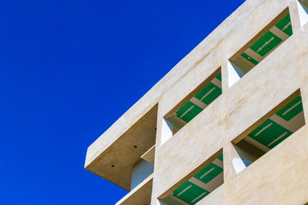 Huge hotel complexes are being built construction sites in Playa del Carmen Mexico.のeditorial素材