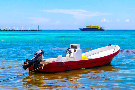 Playa del Carmen Quintana Roo Mexico August 05, 2023 Boat yacht catamaran ship ferry jetty pier and harbor at the tropical Mexican Caribbean beach panorama view and turquoise blue water in Playa del Carmen Mexico.のeditorial素材