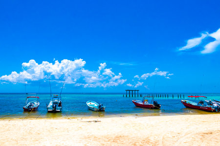 Playa del Carmen Quintana Roo Mexico August 05, 2023 Boat yacht catamaran ship ferry jetty pier and harbor at the tropical Mexican Caribbean beach panorama view and turquoise blue water in Playa del Carmen Mexico.のeditorial素材