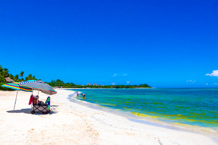 Playa del Carmen Quintana Roo Mexico September 9, 2023 Tropical Mexican Caribbean beach and sea with a lot of fun people sun loungers parasols turquoise water in Playa del Carmen Mexico.のeditorial素材