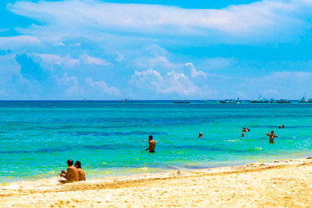 Playa del Carmen Quintana Roo Mexico September 9, 2023 Tropical Mexican Caribbean beach and sea with a lot of fun people sun loungers parasols turquoise water in Playa del Carmen Mexico.のeditorial素材