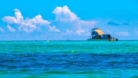 Boat yacht catamaran ship ferry jetty pier and harbor at the tropical Mexican Caribbean beach...