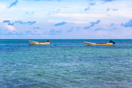 Playa del Carmen Quintana Roo Mexico August 13, 2023 Boat yacht catamaran ship ferry jetty pier and harbor at the tropical Mexican Caribbean beach panorama view and turquoise blue water in Playa del Carmen Mexico.のeditorial素材