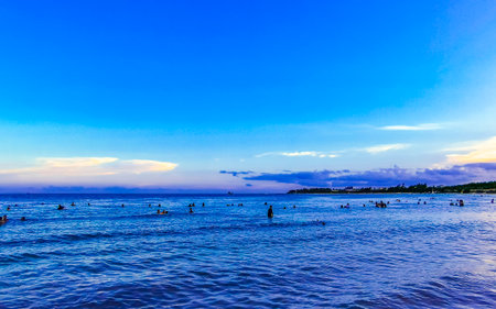 Playa del Carmen Quintana Roo Mexico August 4th, 2023 Tropical Mexican Caribbean beach and sea with a lot of fun people sun loungers parasols turquoise water in Playa del Carmen Mexico.のeditorial素材