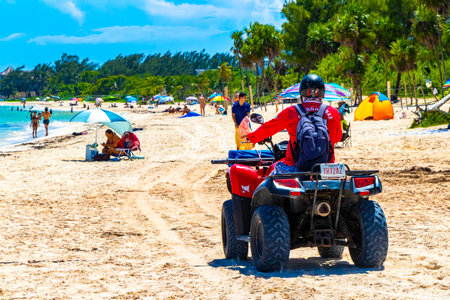 Playa del Carmen Quintana Roo Mexico September 9, 2023 Lifeguard with quad bike on the beach in Playa del Carmen Quintana Roo Mexico.のeditorial素材