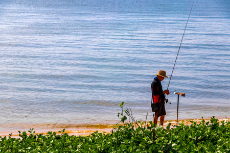 Pattaya Chon Buri Thailand October 29, 2018 Boat Fishing boats fisher with fishing rod and fishing net in Pattaya Bang Lamung Amphoe Chon Buri Thailand in Southeastasia Asia.のeditorial素材