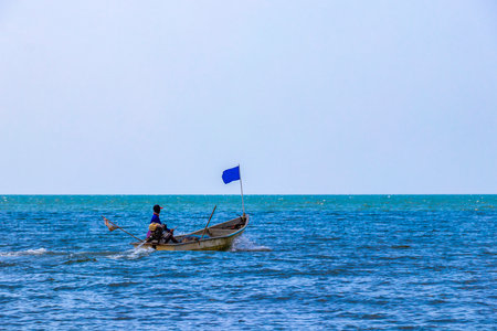 Boat Fishing boats fisherman with fishing rod and fishing net in Pattaya Bang Lamung Amphoe Chon Buri Thailand in Southeastasia Asia.の写真素材