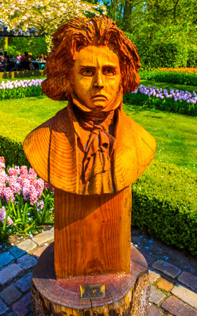 Lisse South Holland Netherlands April 4, 2014 Metal and wooden statue sculpture figure in the park...