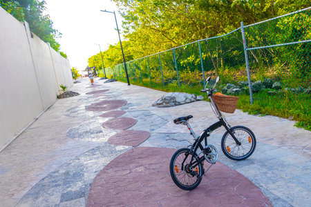 Bicycle Bicycles bike bikes parked in the city in tropical Playa del Carmen Quintana Roo Mexico.のeditorial素材