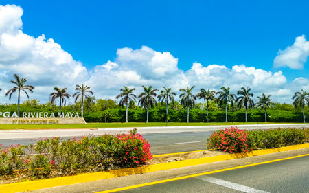 Playa del Carmen Quintana Roo Mexico May 3, 2023 PGA Riviera Maya Golf course palm trees and Mexican flag in Playa del Carmen Quintana Roo Mexico.のeditorial素材