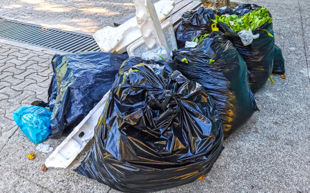 Garbage waste trash dirt garbage cans and environmental pollution in Playa del Carmen Quintana Roo...