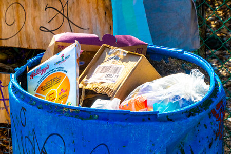 Garbage waste trash dirt garbage cans and environmental pollution in Playa del Carmen Quintana Roo Mexico.のeditorial素材