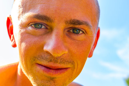 Man face with pollen on his nose in Leherheide Bremerhaven Bremen Germany.の写真素材
