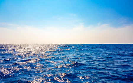 Seascape ocean water and waves on blue whale boat trip catamaran tour in Mirissa Beach Matara District Southern Province Sri Lanka.の写真素材