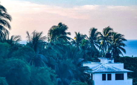 Mountains mountain panorama cliffs hills rocks and hilly tropical landscape with house building hut...