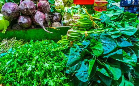 Fresh vegetables Fruit and salad Greens Herbs at the Mexican market in Zicatela Puerto Escondido Oaxaca Mexico.の写真素材