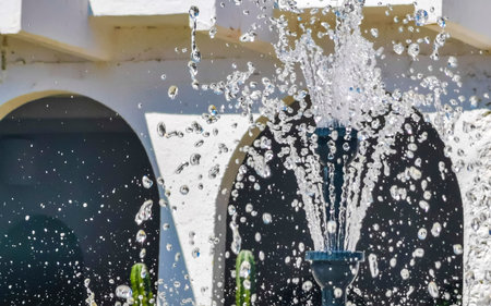 Puerto Escondido Oaxaca Mexico January 20, 2023 Elegant marble fountain in the front garden in...