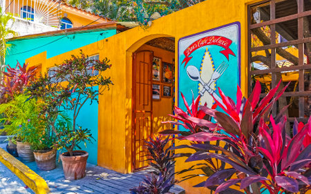 Puerto Escondido Oaxaca Mexico February 01, 2023 The famous restaurant and cafe Dans Cafe Deluxe with people building and inside in Zicatela Puerto Escondido Oaxaca Mexico.のeditorial素材