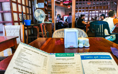 The famous restaurant and cafe El Cafecito with people building and inside in Zicatela Puerto Escondido Oaxaca Mexico.のeditorial素材