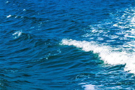Seascape ocean water and waves on blue whale boat trip catamaran tour in Mirissa Beach Matara...