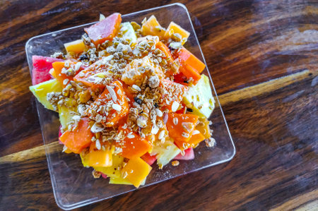 Breakfast at the restaurant with fruits fruit salad with oatmeal in Zicatela Puerto Escondido Mexico.の写真素材