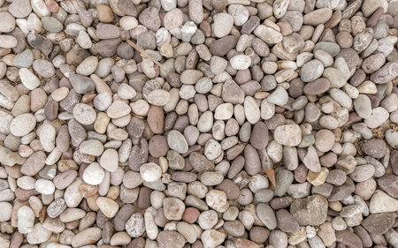Texture detail of many colorful little stones rock in Zicatela Puerto Escondido Oaxaca Mexico.