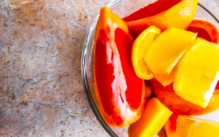 Sliced lemons and grapefruit on a plate in Playa del Carmen Quintana Roo Mexico.の写真素材