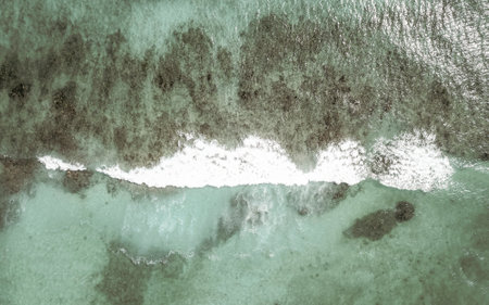 Coral reef Palancar seascape and Caribbean sea panorama with turquoise green and blue water and waves in Playa del Carmen Quintana Roo Mexico.の写真素材