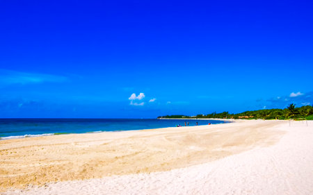 Amazing tropical Mexican Caribbean beach and sea landscape panorama with clear turquoise blue water waves and white sand.の写真素材