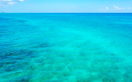 Coral reef Palancar seascape and Caribbean sea panorama with turquoise green and blue water and waves in Playa del Carmen Quintana Roo Mexico.の写真素材
