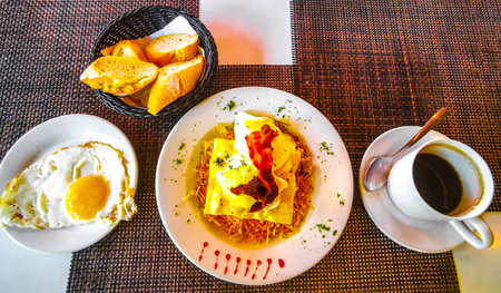 Mexican breakfast with scrambled eggs with toast slices on white plate in Playa del Carmen Quintana Roo Mexico.の写真素材