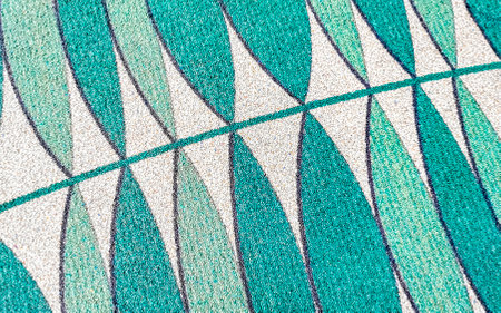 Turquoise green carpet rug texture in the Juan Santamaria International Airport San Jose in Rio Segundo Alajuela Costa Rica in Central America.の写真素材