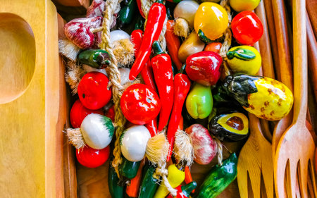 Mexican souvenirs wooden forks spoons and other kitchen utensils in souvenir shop store in Zicatela Puerto Escondido Oaxaca Mexico.の写真素材