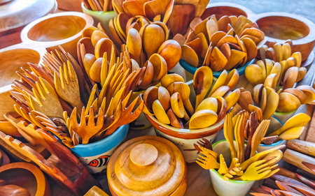 Mexican souvenirs wooden forks spoons and other kitchen utensils in souvenir shop store in Zicatela Puerto Escondido Oaxaca Mexico.の写真素材