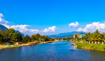 Mountain peak landscape with tropical forest jungle hills rocks and Nam Song river lake water in Vang Vieng Vientiane Province Laos in Southeastasia Asia.の写真素材