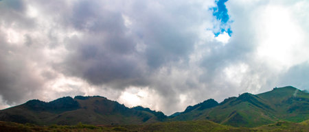 Driving through the mountain landscape dusty and high in Vientiane Province Laos in Southeastasia...