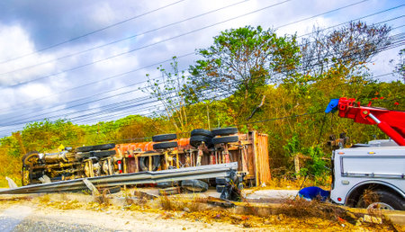 Serious accident Truck falls off the bridge and tips over in Puerto Aventuras Quintana Roo Mexico.の写真素材