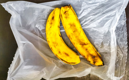 Beautiful ripe yellow banana bananas in Playa del Carmen Quintana Roo Mexico.の写真素材