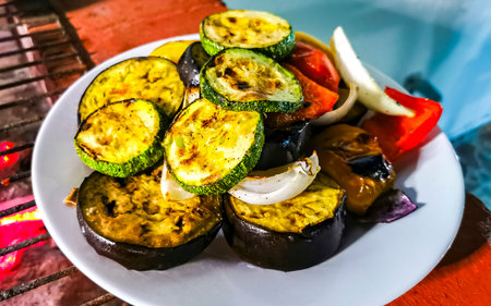 Grill party grill vegetables onions eggplant and bell peppers in Playa del Carmen Quintana Roo Mexico.の写真素材