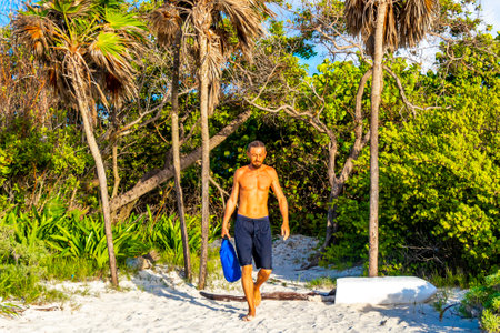 Handsome man tourist in tropical nature in Playa del Carmen Quintana Roo Mexico.の写真素材
