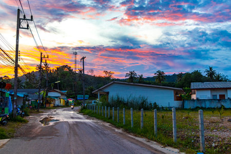 Sunset over the country and road in Ao Nang Amphoe Mueang Krabi Thailand in Southeast Asia.の写真素材